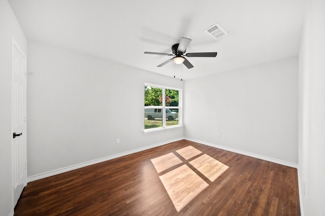407 Bradley St, Dallas, TX 75224 - spare room with a ceiling fan and dark wood-type flooring