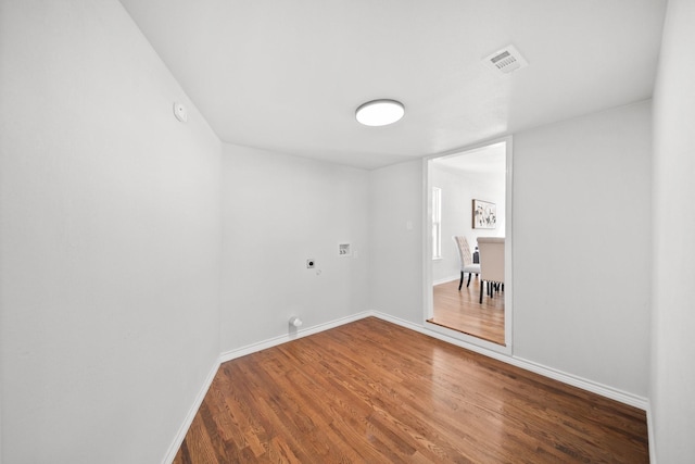 407 Bradley St, Dallas, TX 75224 - spare room with wood finished floors and baseboards