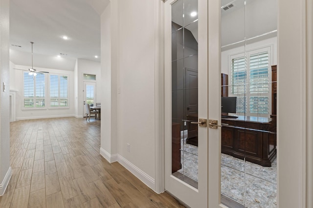 16317 Bidwell Park Dr, Prosper, TX 75078 - corridor featuring wood finished floors, french doors, and recessed lighting