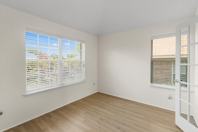 312 Goldeneye Ln, Fort Worth, TX 76120 - empty room featuring wood finished floors and baseboards