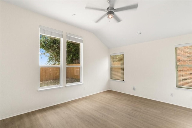312 Goldeneye Ln, Fort Worth, TX 76120 - empty room featuring wood finished floors, lofted ceiling, and a ceiling fan