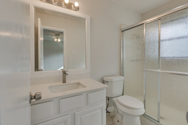 1006 Sleepy Hollow Dr, Garland, TX 75043 - full bath featuring an enclosed shower, vanity, ceiling fan, and tile patterned flooring