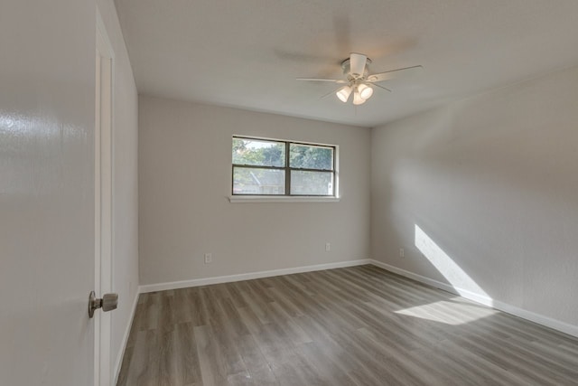1006 Sleepy Hollow Dr, Garland, TX 75043 - unfurnished room featuring wood finished floors and ceiling fan