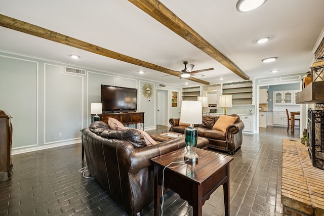 1509 Bar Harbor Dr, Dallas, TX 75232 - living area featuring brick flooring, a decorative wall, ceiling fan, beamed ceiling, and recessed lighting