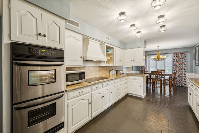 1509 Bar Harbor Dr, Dallas, TX 75232 - kitchen with stainless steel appliances, custom range hood, brick patterned flooring, and white cabinets