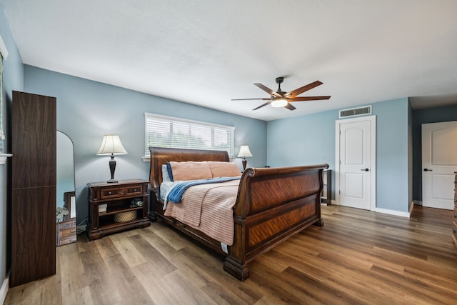 1509 Bar Harbor Dr, Dallas, TX 75232 - bedroom featuring wood finished floors and ceiling fan