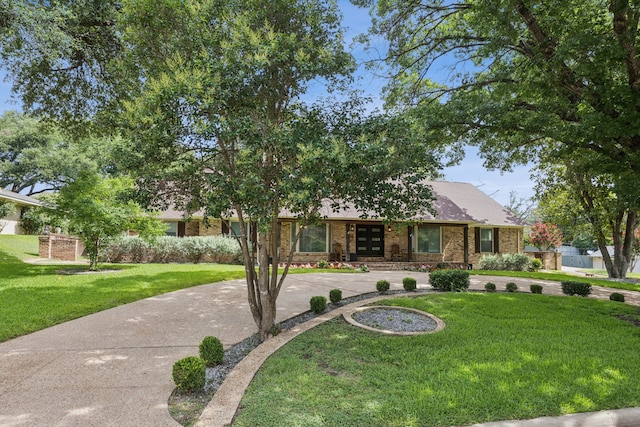 1509 Bar Harbor Dr, Dallas, TX 75232 - view of front facade with curved driveway, french doors, a front yard, and brick siding