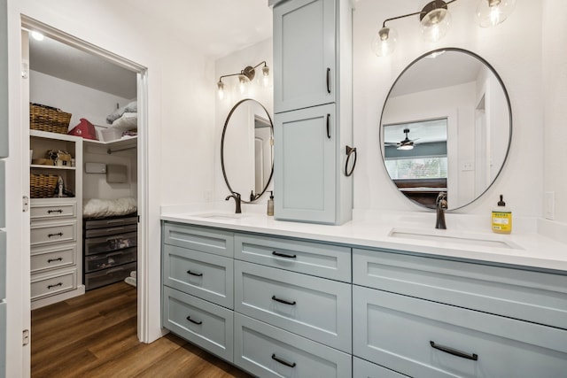 1509 Bar Harbor Dr, Dallas, TX 75232 - full bathroom with double vanity, wood finished floors, and a closet