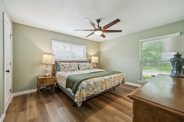 1509 Bar Harbor Dr, Dallas, TX 75232 - bedroom featuring dark wood-type flooring and a ceiling fan
