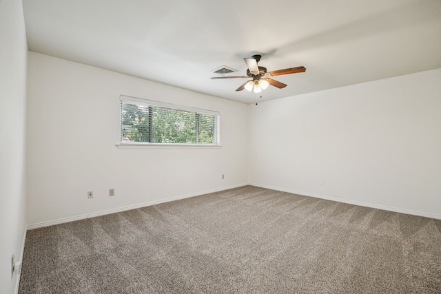 1509 Bar Harbor Dr, Dallas, TX 75232 - unfurnished room featuring carpet flooring and a ceiling fan