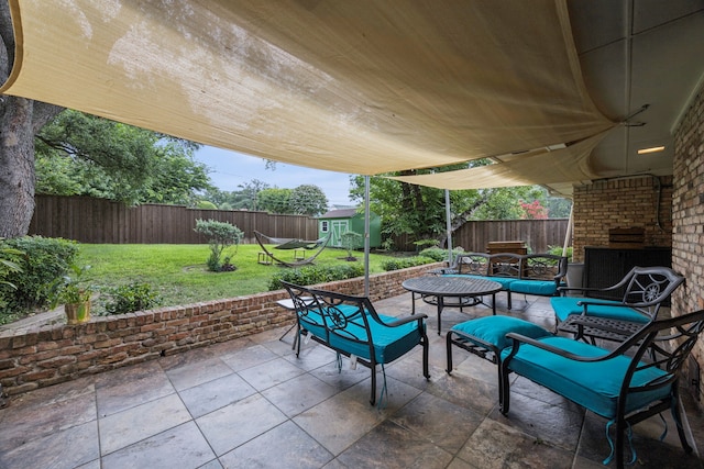 1509 Bar Harbor Dr, Dallas, TX 75232 - fenced backyard featuring a patio area, outdoor dining area, and a shed