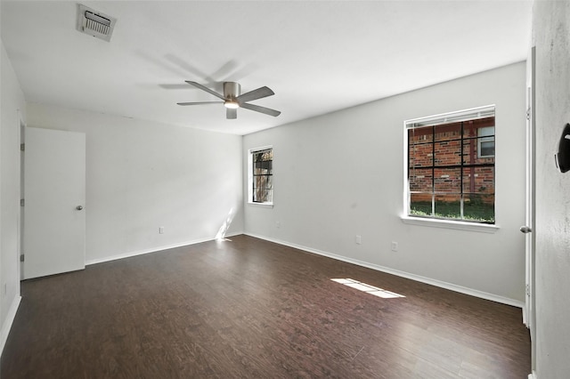 8109 Starnes Rd, North Richland Hills, TX 76182 - empty room featuring dark wood-style flooring and ceiling fan