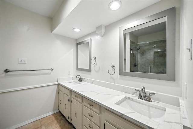 8109 Starnes Rd, North Richland Hills, TX 76182 - bathroom featuring double vanity, a shower stall, and recessed lighting