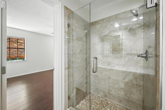 8109 Starnes Rd, North Richland Hills, TX 76182 - bathroom with a shower stall and wood finished floors
