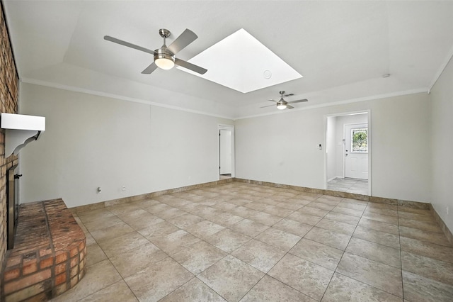 8109 Starnes Rd, North Richland Hills, TX 76182 - unfurnished living room with a ceiling fan, a skylight, ornamental molding, a raised ceiling, and light tile patterned floors