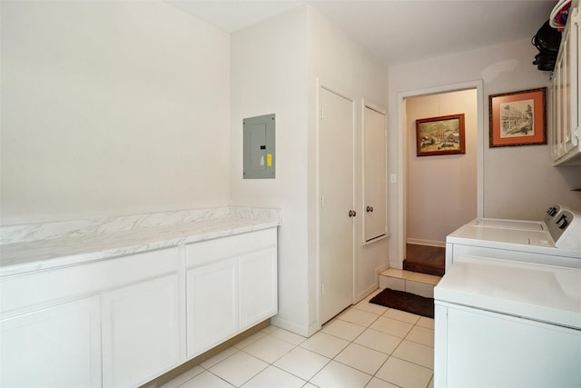 201 N Frederick St, Ponder, TX 76259 - laundry area with cabinet space, separate washer and dryer, electric panel, and light tile patterned floors
