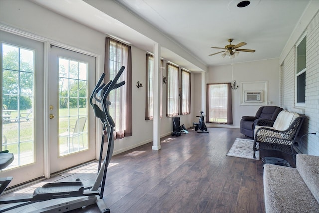 201 N Frederick St, Ponder, TX 76259 - workout area with healthy amount of natural light, wood finished floors, ceiling fan, and a wall unit AC