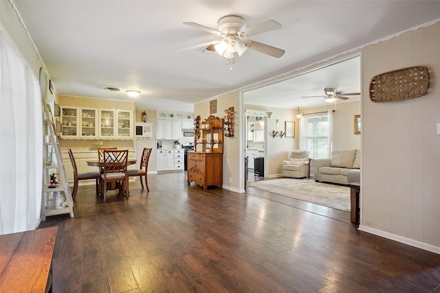 201 N Frederick St, Ponder, TX 76259 - dining space featuring ceiling fan and dark wood-style floors