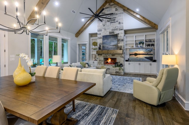14631 Reserve Ct, Tyler, TX 75707 - living room featuring beamed ceiling, a chandelier, dark wood-style flooring, a stone fireplace, and ceiling fan