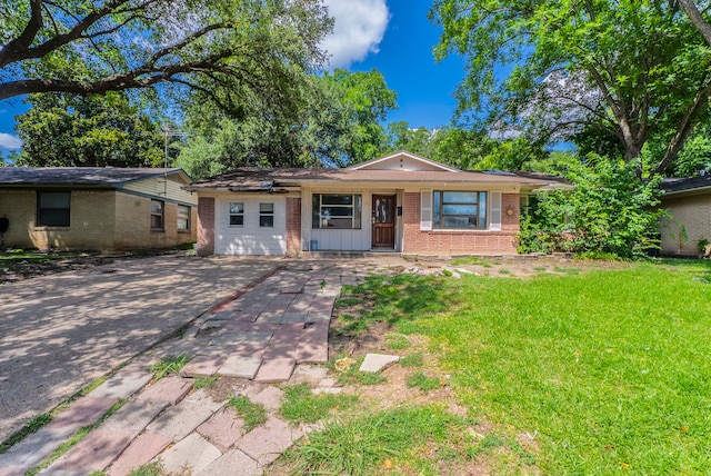 4608 Sandra Lynn Dr, Mesquite, TX 75150 - ranch-style house featuring brick siding, a front yard, and a porch