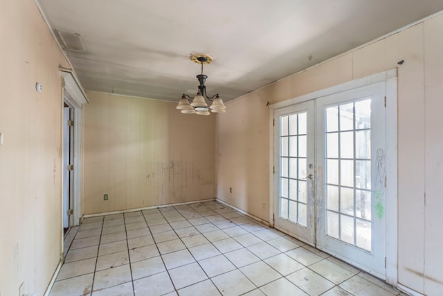 4608 Sandra Lynn Dr, Mesquite, TX 75150 - empty room with french doors, a chandelier, and light tile patterned flooring