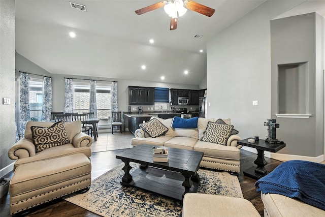 1312 Castlegar Ln, Fort Worth, TX 76247 - living room featuring lofted ceiling, a ceiling fan, recessed lighting, and wood finished floors