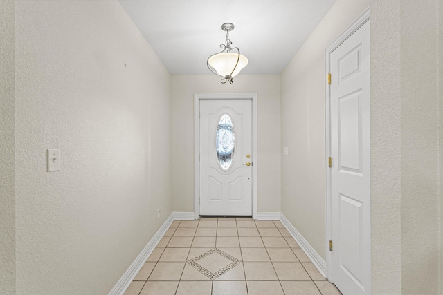 102 Southfork Cir, Pottsboro, TX 75076 - doorway to outside featuring baseboards and light tile patterned flooring