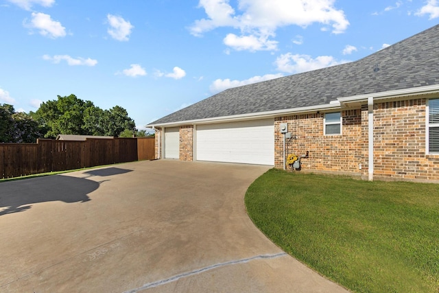 102 Southfork Cir, Pottsboro, TX 75076 - view of property exterior featuring concrete driveway, brick siding, a shingled roof, and a garage