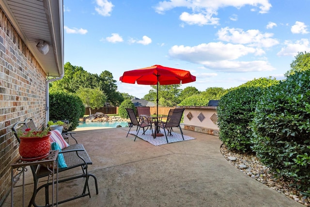 102 Southfork Cir, Pottsboro, TX 75076 - fenced backyard featuring a patio and outdoor dining area