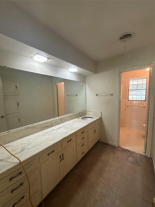 817 Brook Valley Ln, Dallas, TX 75232 - full bath with vanity and tile patterned floors