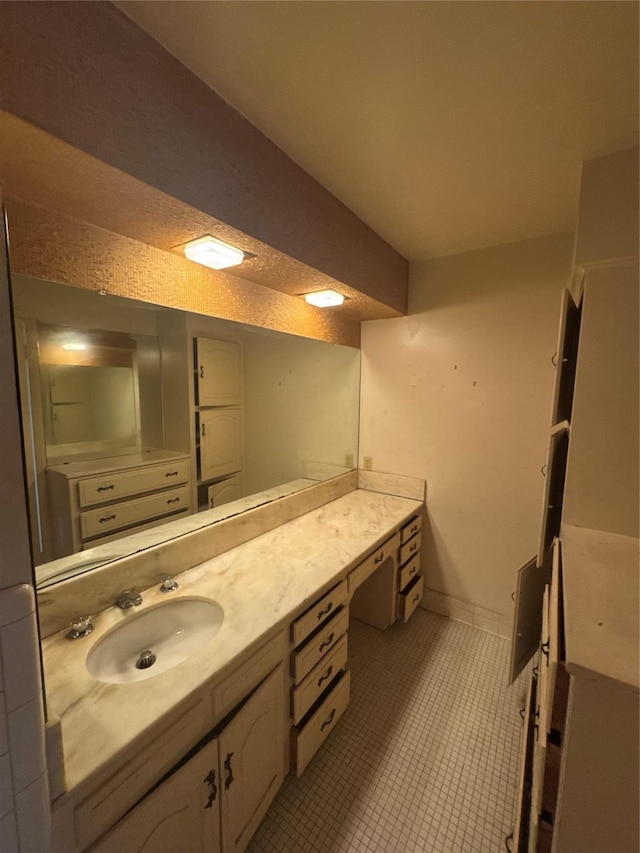 817 Brook Valley Ln, Dallas, TX 75232 - bathroom with vanity and tile patterned flooring