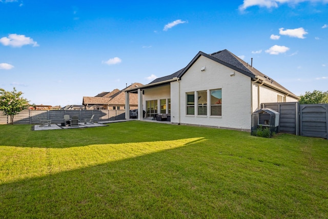 7020 Union Park Blvd E, Little Elm, TX 76227 - rear view of house featuring a patio area, a fenced backyard, and brick siding