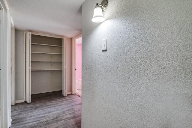 4137 Salem Dr, Garland, TX 75043 - corridor featuring wood finished floors