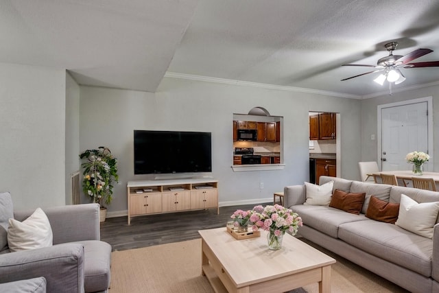 4137 Salem Dr, Garland, TX 75043 - living room featuring dark wood finished floors, ceiling fan, and crown molding