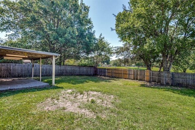4137 Salem Dr, Garland, TX 75043 - fenced backyard with a patio area