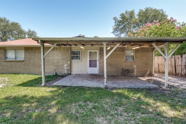 4137 Salem Dr, Garland, TX 75043 - rear view of house featuring a patio and brick siding