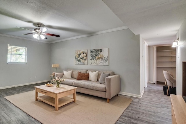 4137 Salem Dr, Garland, TX 75043 - living area featuring wood finished floors, crown molding, and ceiling fan