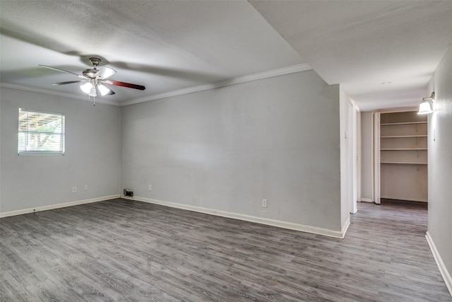 4137 Salem Dr, Garland, TX 75043 - spare room with ornamental molding, wood finished floors, and a ceiling fan