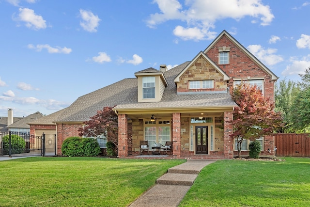 1709 Blair Ct, Carrollton, TX 75010 - view of front of home featuring a gate, covered porch, a shingled roof, and french doors