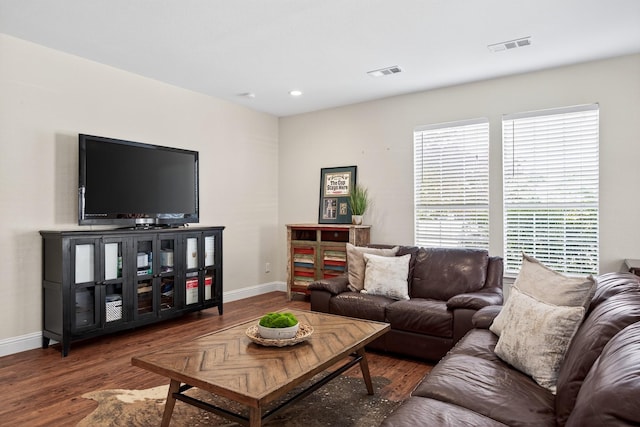 1709 Blair Ct, Carrollton, TX 75010 - living area featuring wood finished floors and recessed lighting