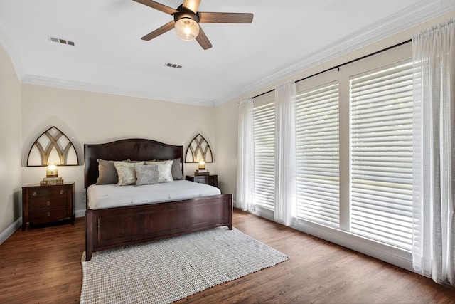 1709 Blair Ct, Carrollton, TX 75010 - bedroom with crown molding, wood finished floors, and ceiling fan