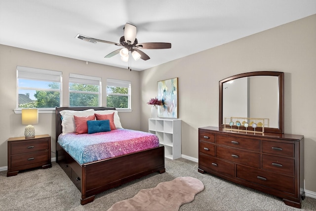 1709 Blair Ct, Carrollton, TX 75010 - bedroom with light carpet and a ceiling fan