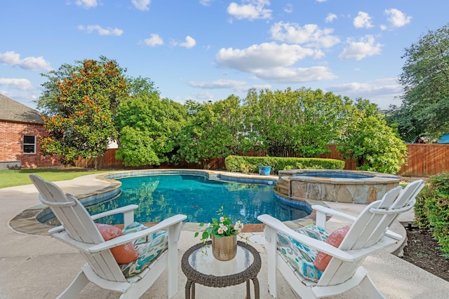1709 Blair Ct, Carrollton, TX 75010 - view of pool with a fenced backyard, a pool with connected hot tub, and a patio area