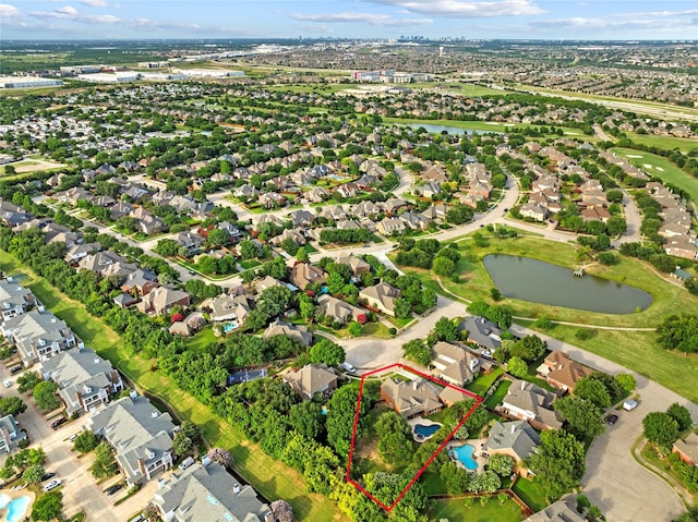 1709 Blair Ct, Carrollton, TX 75010 - aerial perspective of suburban area with property parcel outlined and a nearby body of water
