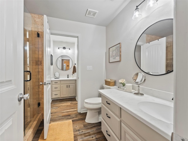 153 Bridlepath Dr, Pottsboro, TX 75076 - bathroom featuring a shower stall, wood finished floors, and vanity