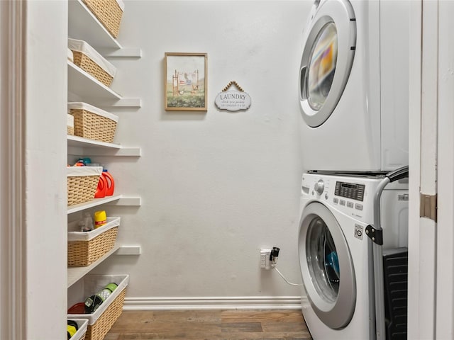 153 Bridlepath Dr, Pottsboro, TX 75076 - laundry room with estacked washer and dryer and wood finished floors