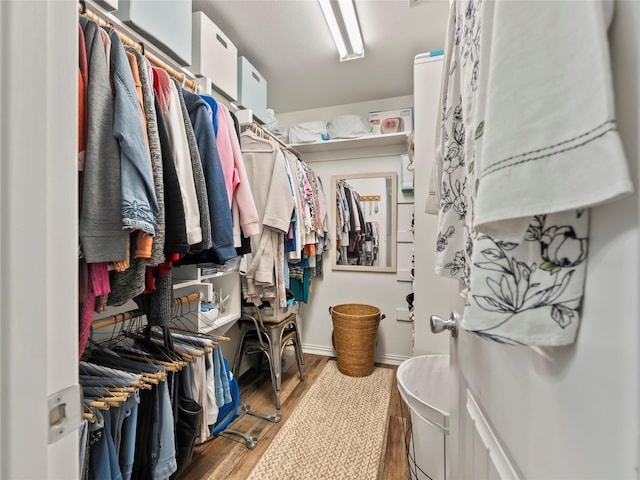 153 Bridlepath Dr, Pottsboro, TX 75076 - spacious closet featuring wood finished floors