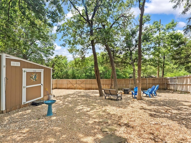 153 Bridlepath Dr, Pottsboro, TX 75076 - fenced backyard featuring a storage unit and view of scattered trees