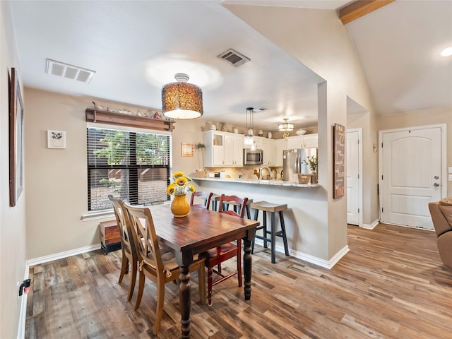 153 Bridlepath Dr, Pottsboro, TX 75076 - dining area featuring baseboards and light wood finished floors