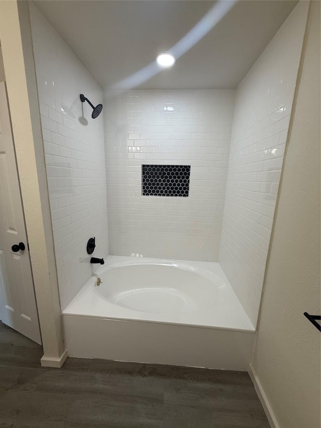 2703 Hollow Bnd, Mesquite, TX 75150 - full bathroom featuring wood finished floors and shower / washtub combination